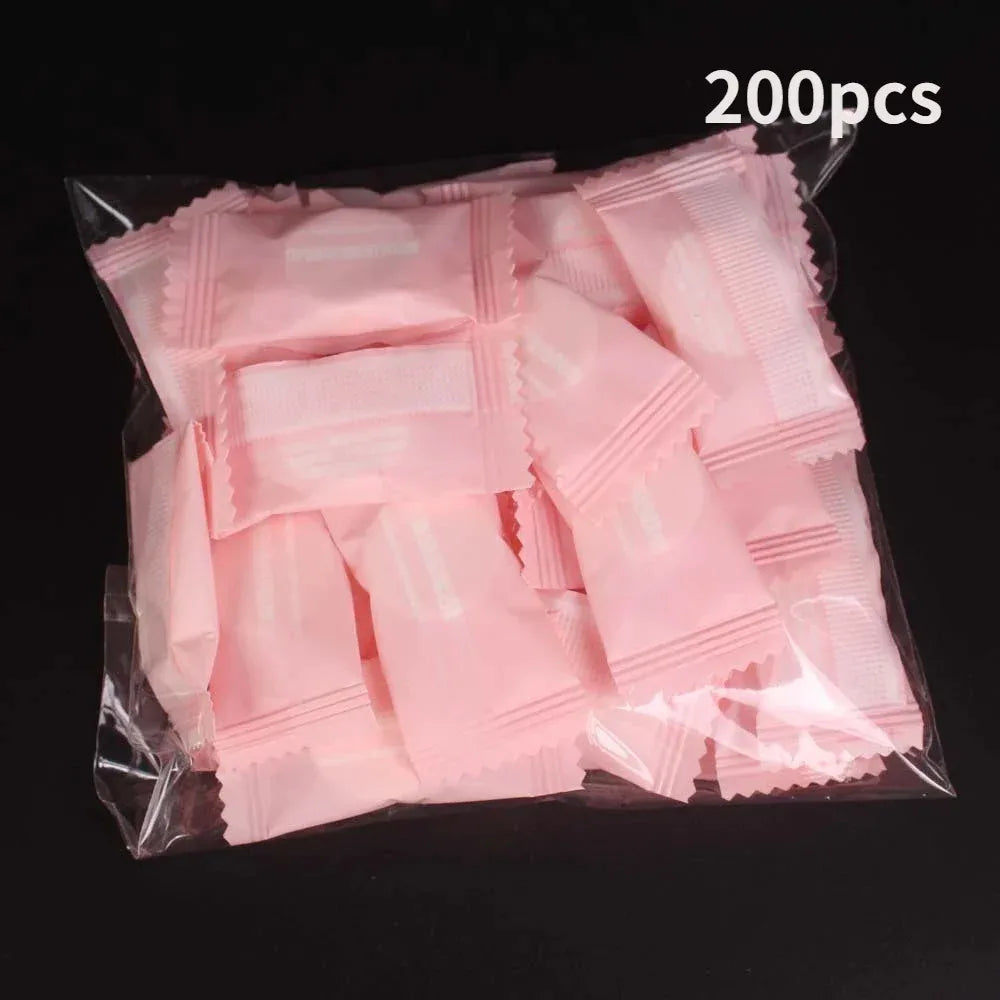 100pcs Mini Compressed Towel Disposable Capsules Towel Magic Face Care Tablet Outdoor Travel Cloth Wipes Paper Tissue Mask